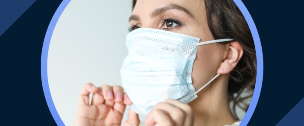 Woman with a mask on looking into the distance