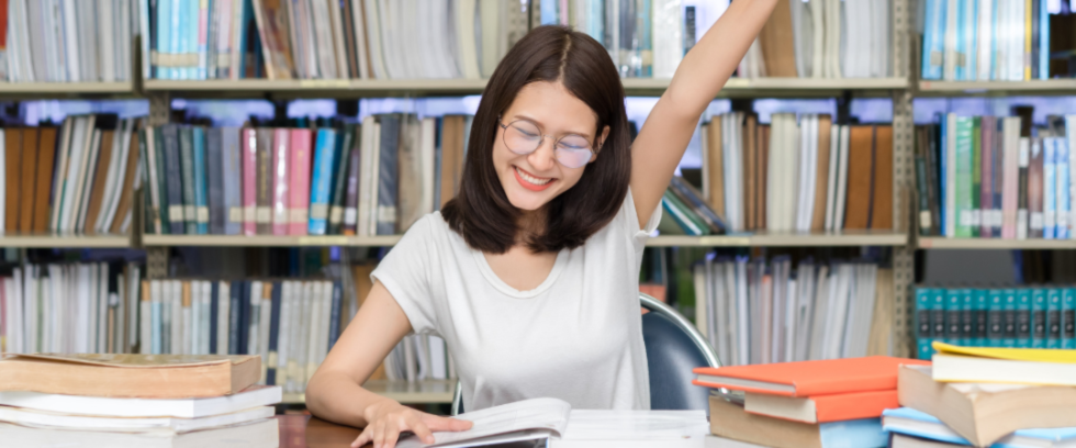 Woman in a school library studying