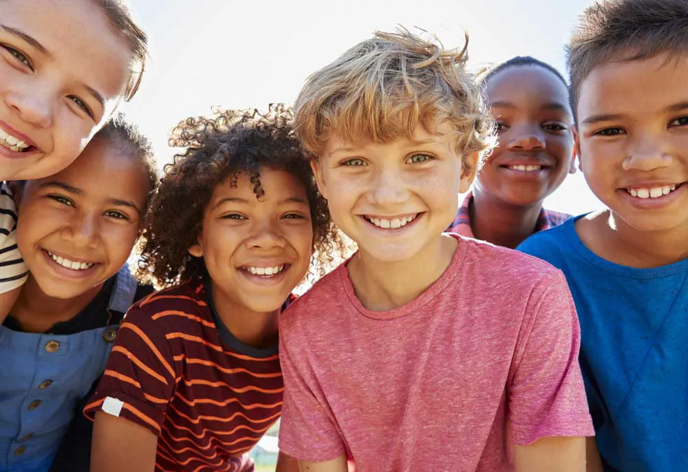 group of diverse kids smiling