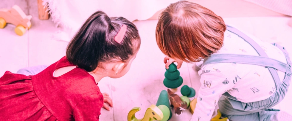 Two children playing with toys