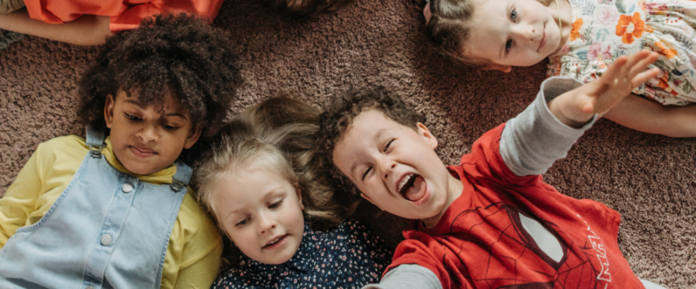 Children laying down together